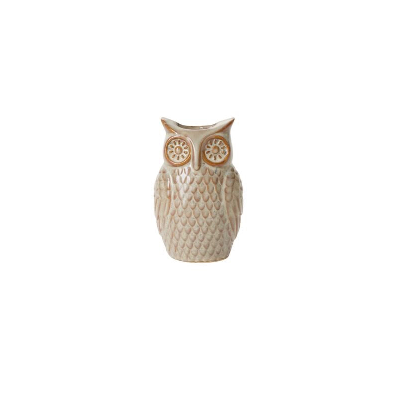 Ceramic owl-shaped vase on a white background