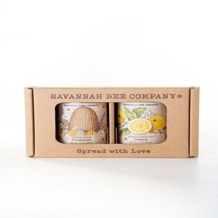 Two candles in a Savannah Bee Company box on a white background