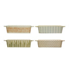 Four ceramic baking dishes with patterned exteriors on a white background