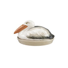 Ceramic pelican-shaped container on a white background