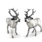 Two silver deer figurines with large antlers on a white background