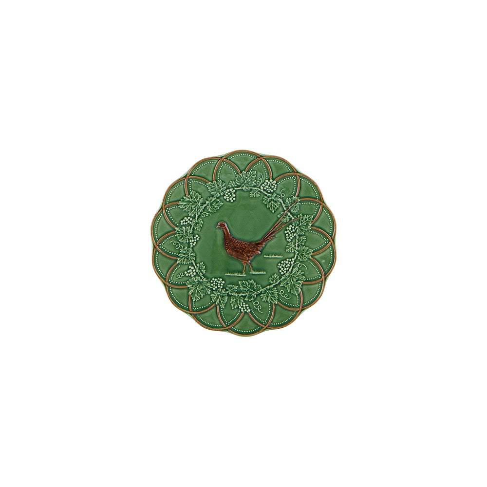Decorative green plate with a bird design on a white background