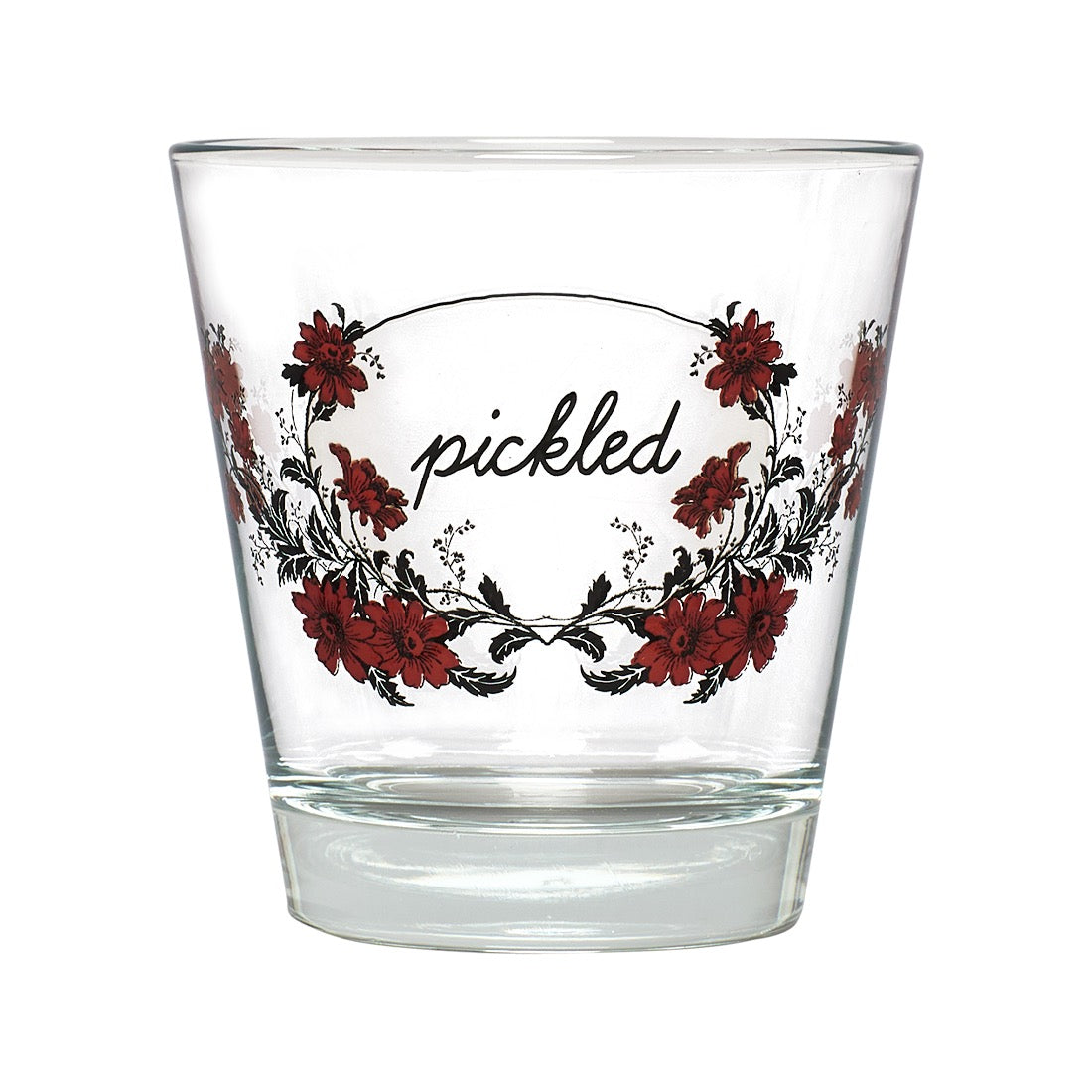 A clear glass shot glass featuring a red floral wreath design with the word 'pickled' written in black script in the center, shown against a plain white background.