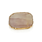 Smoky quartz crystal with gold edge on a white background