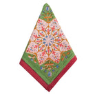 Decorative towel with intricate patterns on a white background