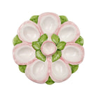 Decorative ceramic plate with a floral design on a white background