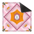 Pink and orange board game box with decorative elements on a white background