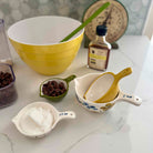 Baking ingredients and utensils on a kitchen counter