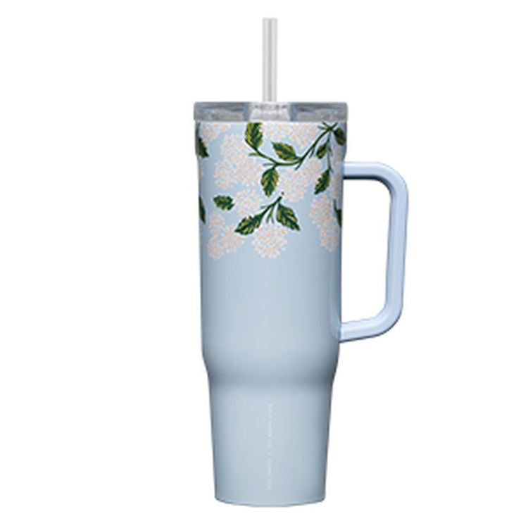 Light blue mug with floral design and handle on a white background