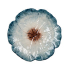 Decorative plate with a floral design on a white background