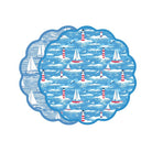 Pattern of sailboats and lighthouses on a blue background