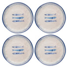 Set of four ceramic plates with blue fish design on a white background