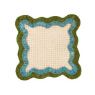 Decorative square mat with wavy green and blue border on a white background
