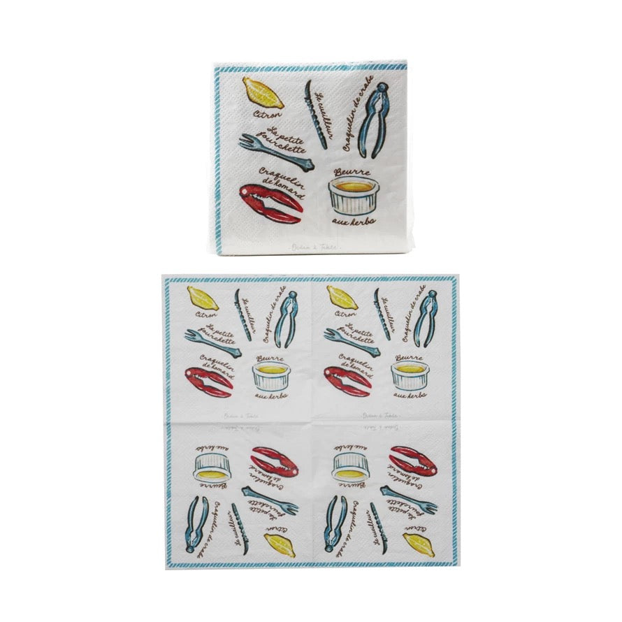 Two kitchen towels with embroidered designs on a white background