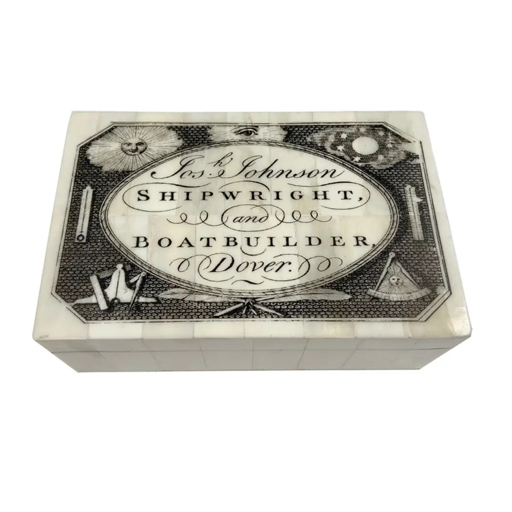 Decorative box with vintage shipwright design on a white background