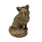 Bronze wolf figurine on a white background