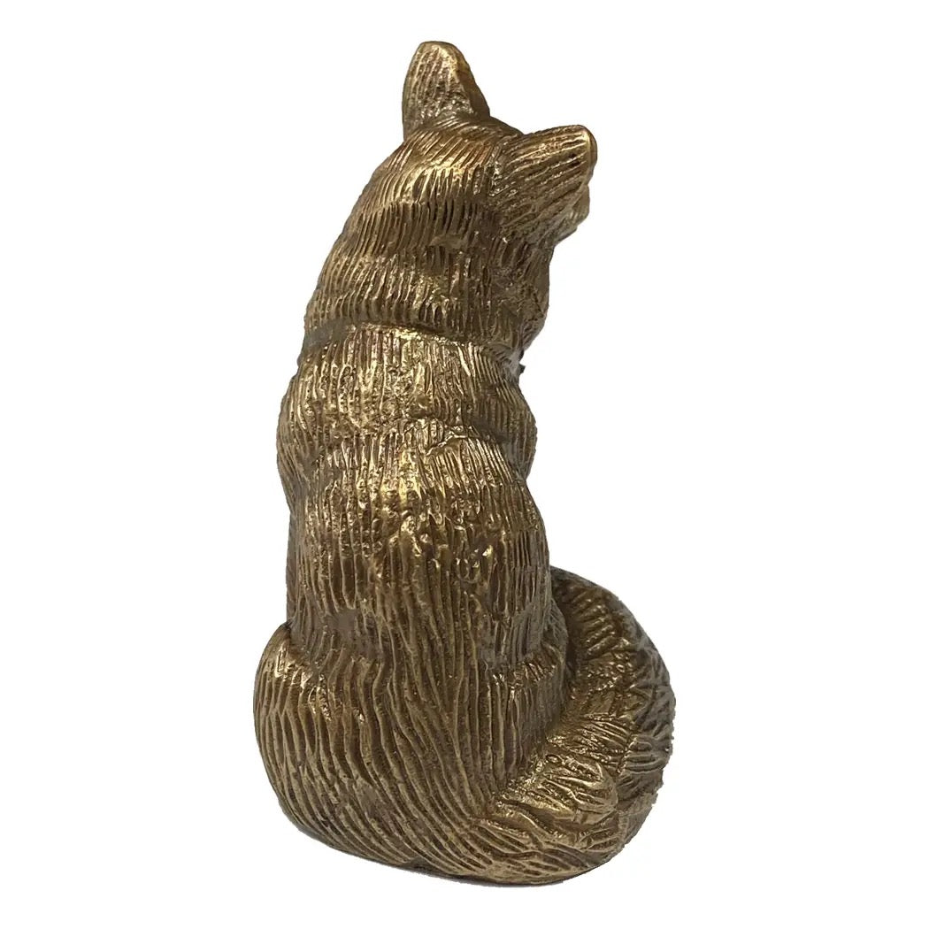 Bronze fox figurine on a white background