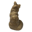 Bronze fox figurine on a white background