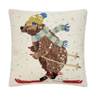 Decorative pillow with a bear skiing design on a white background