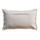 Beige pillow with frayed edges on a white background