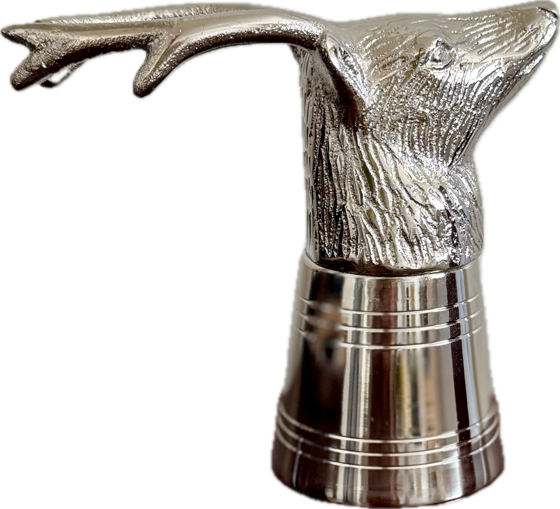 Metallic deer head bottle opener on a white background