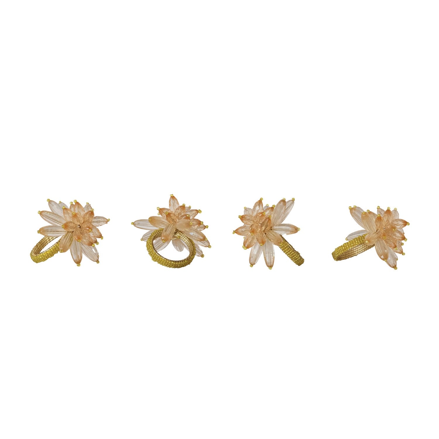 Four floral hair clips on a white background