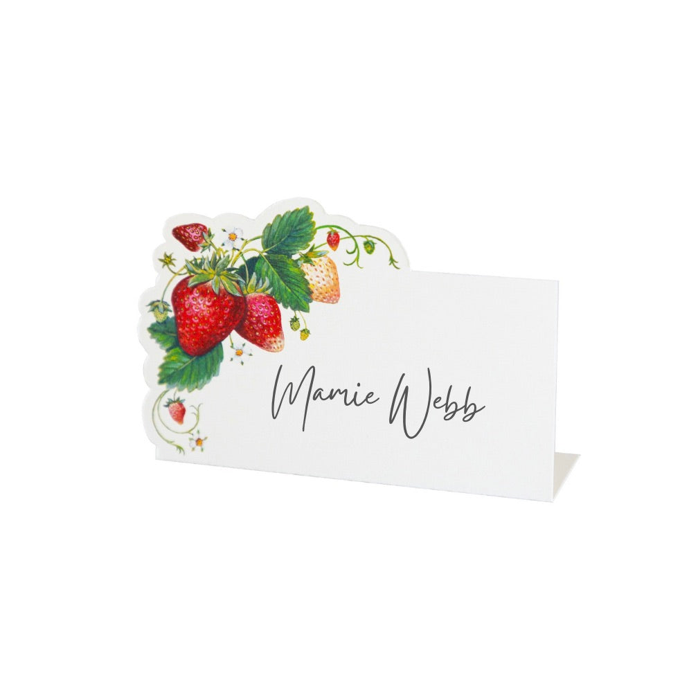 Place card with strawberry design and 'Marie Webb' text on a white background