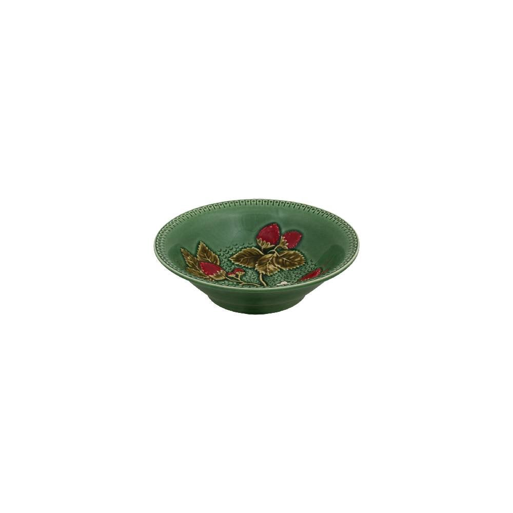Green ceramic bowl with floral design on a white background