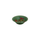 Green ceramic bowl with floral design on a white background