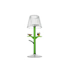 Decorative lamp with a clear shade and green base featuring bird designs on a white background