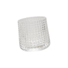 Clear textured glass vase on a white background