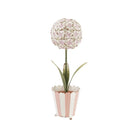 Decorative plant ball in a striped pot on a white background
