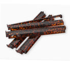 Six tortoiseshell-patterned rectangular plastic strips, likely replacement parts or craft components, arranged in a stack on a white background.