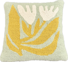 Decorative pillow with yellow and white leaf pattern on a light green background