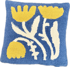 Decorative pillow with floral pattern on a blue background