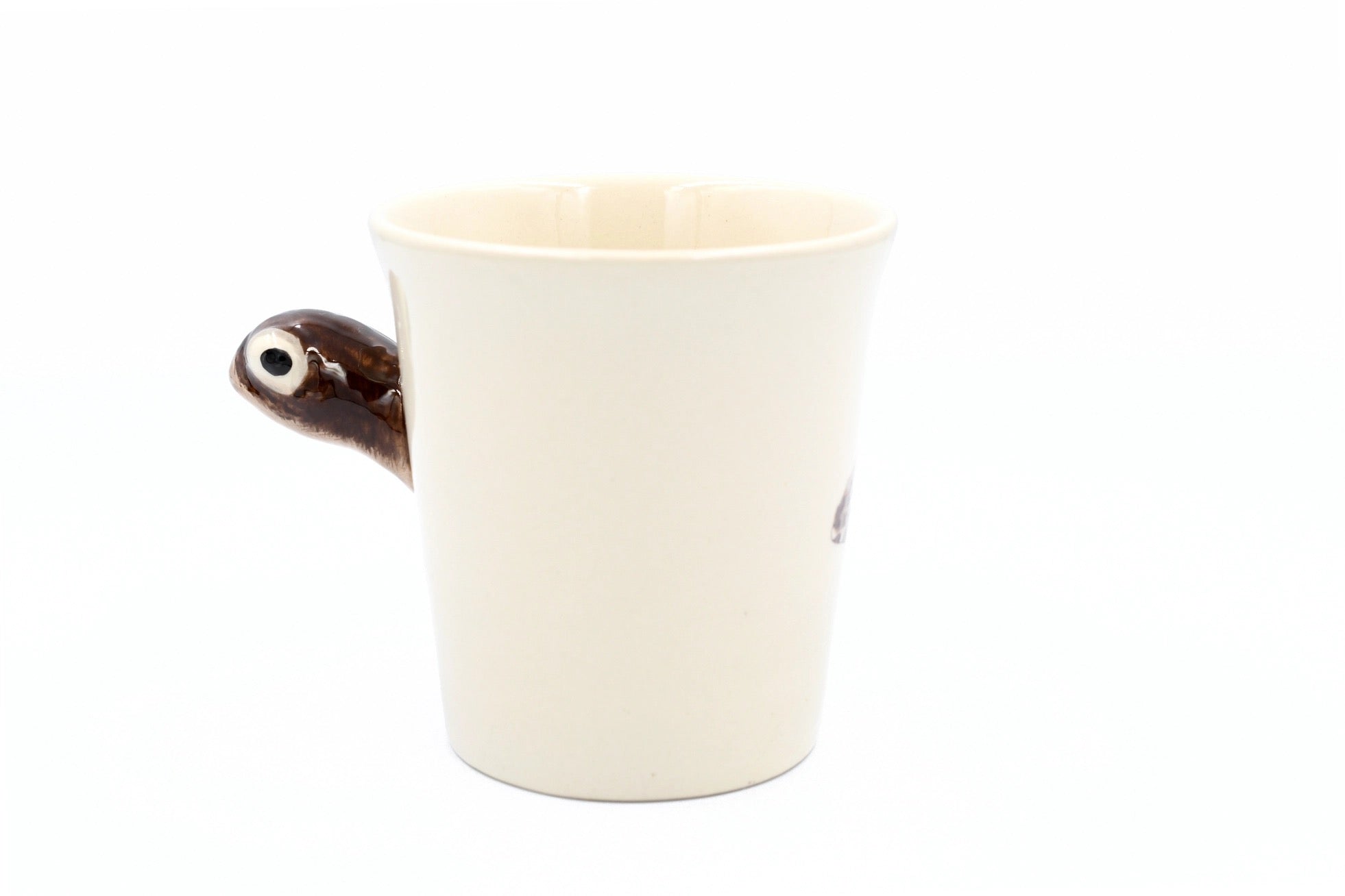 White ceramic mug with a brown handle on a white background