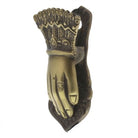 Decorative wall hook with a design resembling a hand on a white background