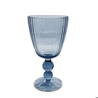 Blue glass goblet on a white background