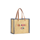 Woven tote bag with colorful text on a white background