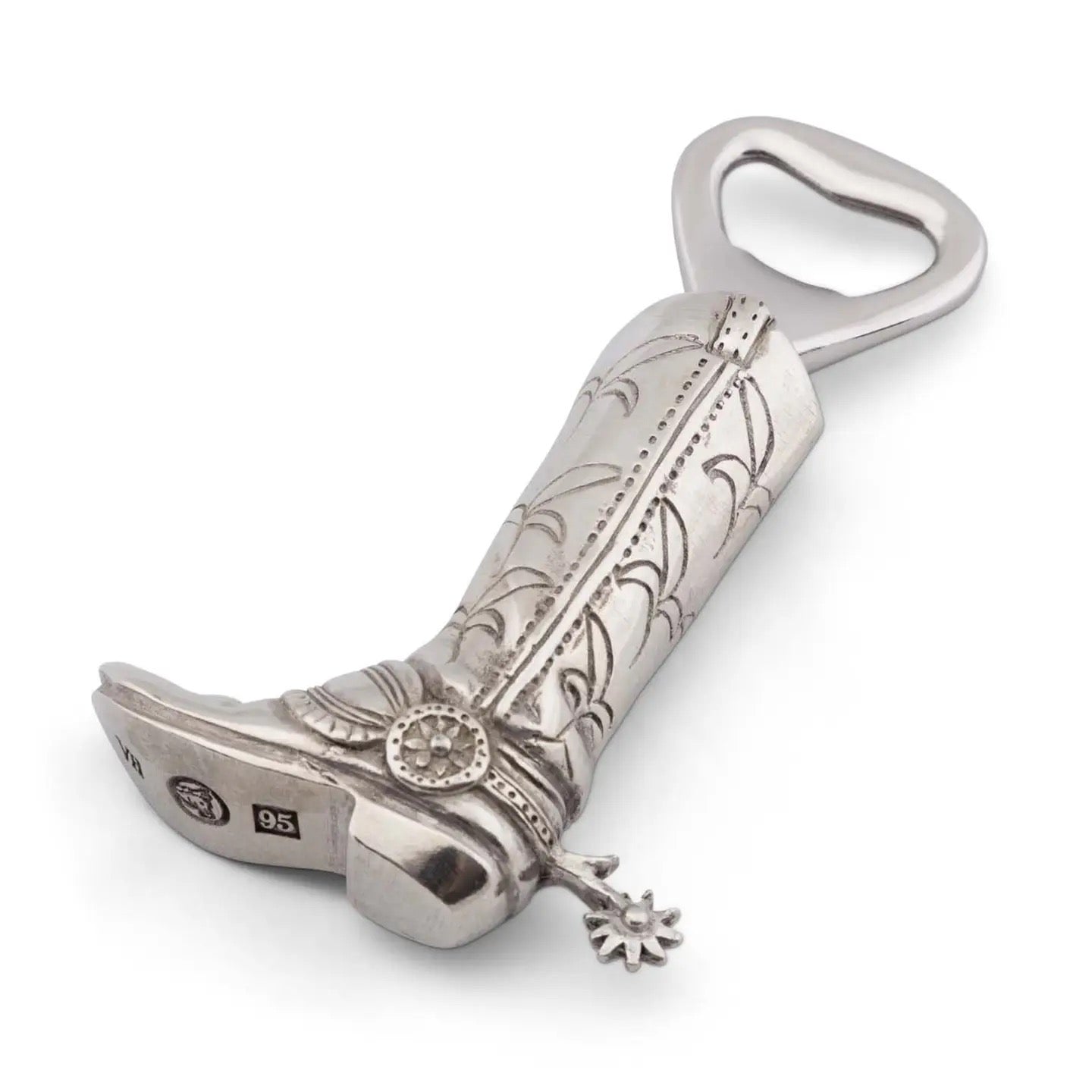 Silver boot-shaped bottle opener with intricate designs on a white background