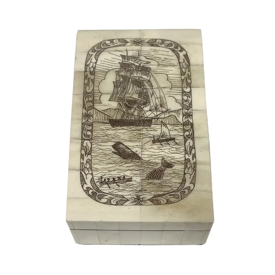 Wooden box with ship design on a white background