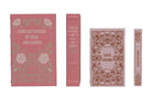 Set of decorative books with floral and text designs on pink backgrounds