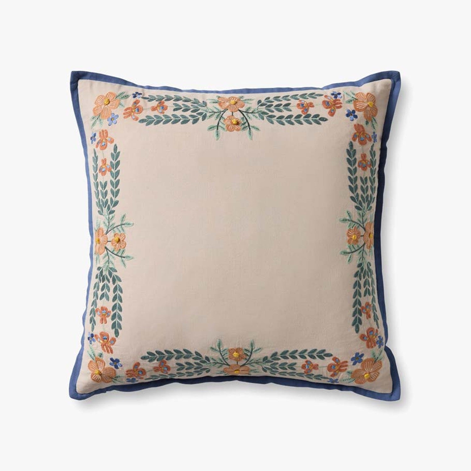 A square decorative throw pillow with a cream center, a navy blue border, and embroidered floral and leafy patterns in orange, green, and blue along the edges, shown on a light gray background.