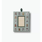A decorative picture frame with a hanging ribbon, featuring a green and white striped pattern with various cat illustrations around a central cream-colored label area.