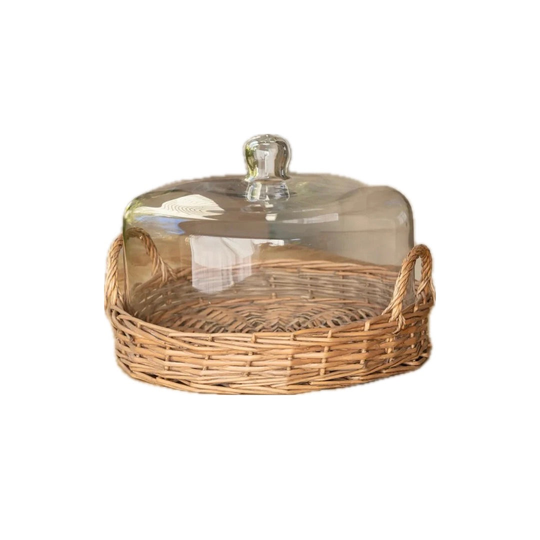 Wicker bread basket with glass lid on a white background