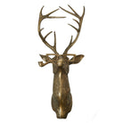 A bronze-colored metal wall mount in the shape of a stag's head with antlers, from the Eric and Eloise Collection.